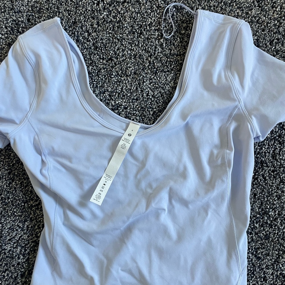 Lululemon Athletica Cream Short Sleeve Fitted Bodysuit